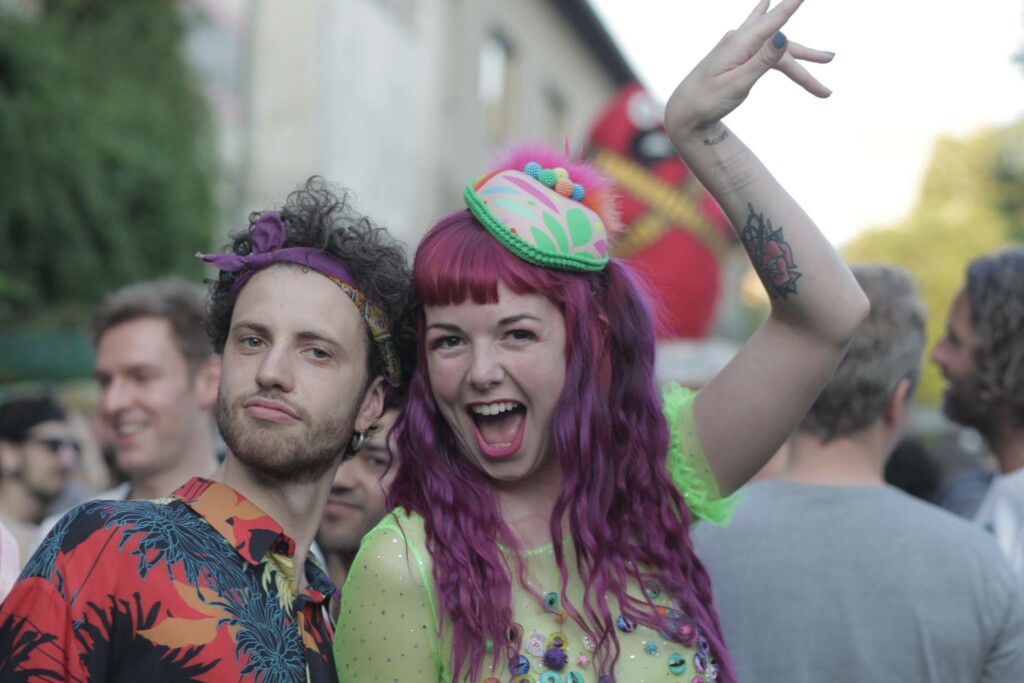 cute-girl-with-purple-hair-outdoor-festival-bmva