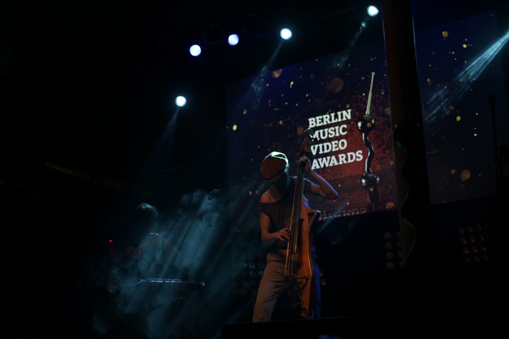 musician-playing-cello-live-performance-on-stage-berlin-music-video-awards